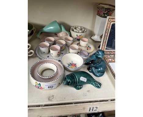 A quantity of Poole pottery including egg cups 