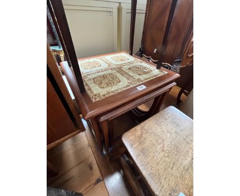 A mid 20th century G plan teak and tile top nest of tables. 