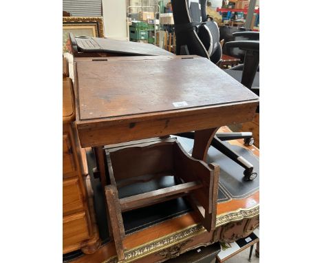Two vintage child's school desks, one with fold-out chair. 