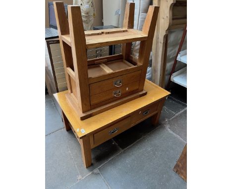 A light oak coffee table and similar side table. 