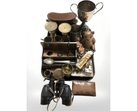 A group of metal wares including pair of brass pricket candlesticks, silver plated trophy, tankard, graduated mugs, cutlery, 