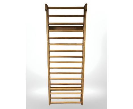 A Swedish pine wall ladder, 80 cm x 14 cm x 220 cm.