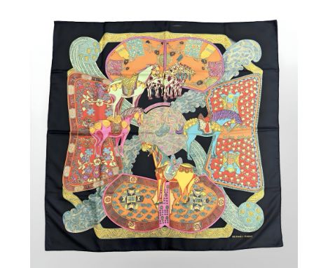 A Hermes silk scarf 'Art Des Steppes', together with gold plated Hermes scarf clip, both parts boxed