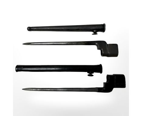 Two British No. 4 Mk 2 spike bayonets, one with steel scabbard and other with late pattern tubular steel scabbard. 