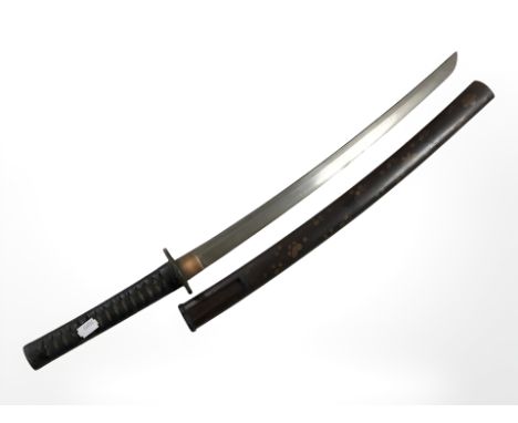 A reproduction Japanese short sword (or Wakizashi) in lacquered wood scabbard, blade 54 cm.