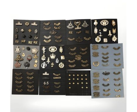 A good collection of approximately 142 circa First World War and later British Army shoulder rank badges, cap badges and butt