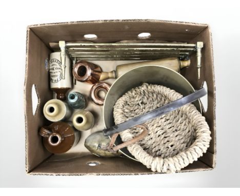 A group of 19th century stone ware bottles bearing various advertising, brass jam pan, wicker basket, rolling pin, brass triv