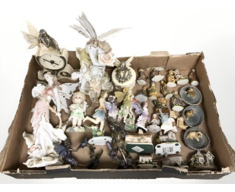 A quantity of ceramic figures, David Winter cottage and four other similar models, fairy figures etc 