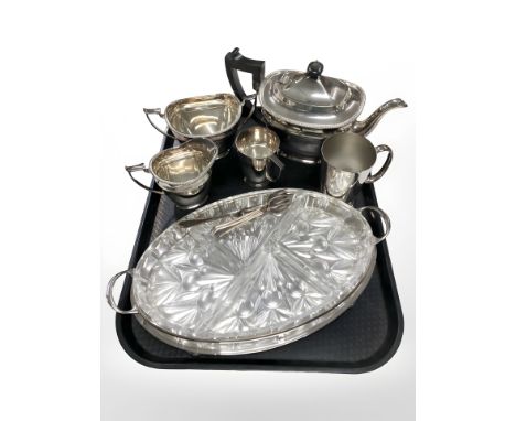An EPNS three piece tea service, two mugs, glass lined dish etc 