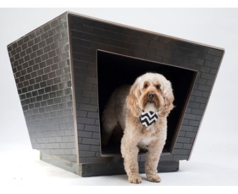 This kennel, made entirely of stainless steel tile, is a collaborative effort between Jay Goulde of Outdoor Arts Foundation, 