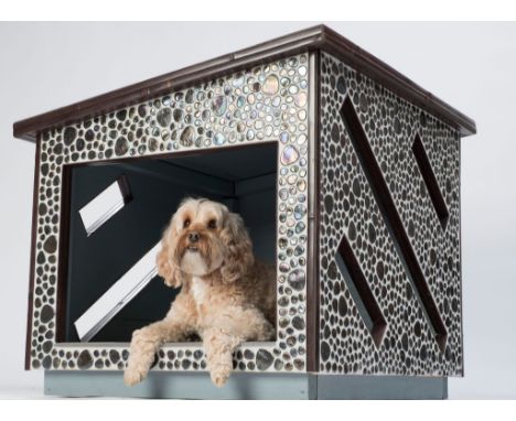 From Greta Sanders Kusterbeck and Nigel Milligan of Tons of Tile comes this gorgeous kennel made of iridised tile beads and a