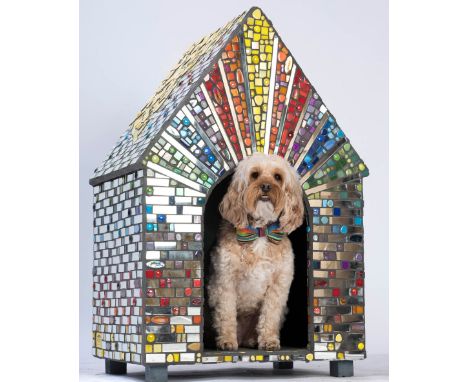By Sue Penrose. Made from mirror, glass and ceramic tiles. Designed to bring year round sunshine  and joy to you and your dog