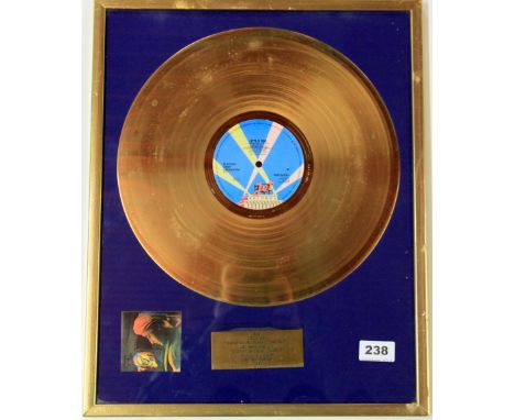 A framed gold disc for the Electric Light Orchestra, Discovery 100,000 records sold in Sweden 1980.
