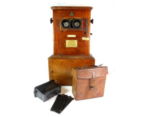 A rare French mahogany cased stereo photograph viewer and stereo camera together with Le Glyphoscope black Bakelite camera by