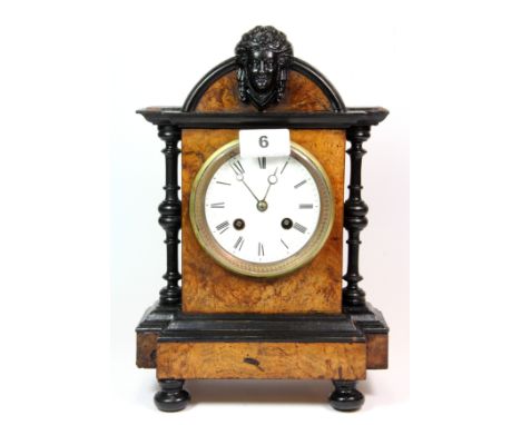 A 19th century striking mantle clock, H. 30cm.