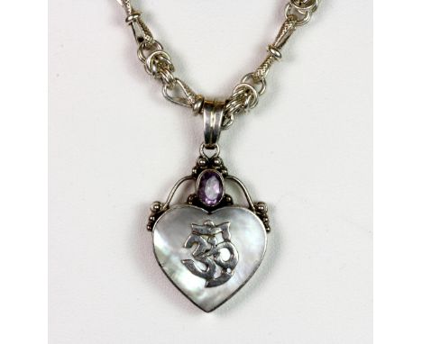 A 925 silver pendant and chain set with mother of pearl and an amethyst.