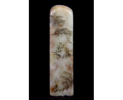 A Chinese carved hardstone seal, mid 20th century, engraved with images of a mountain landscape, H. 12cm.