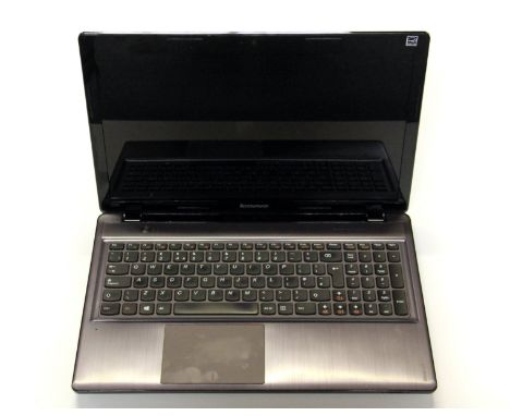 A Lenovo laptop with its corresponding charger and a carry case. Please note this is a credit card reclaim item sold as seen 