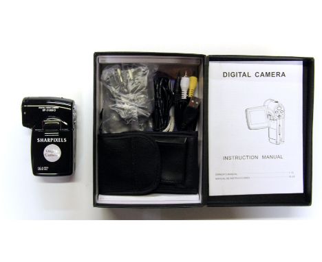 A boxed Sharpixels videocamera with a quantity of accessories. Please note this is a credit card reclaim item sold as seen an