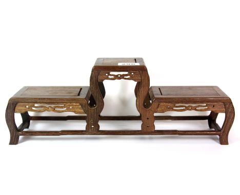 A Chinese rosewood three level display stand, W. 41cm, H.15cm.