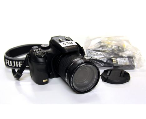 A Fujifilm Finepix camera together with a charger and battery. Please note this is a credit card reclaim item sold as seen an