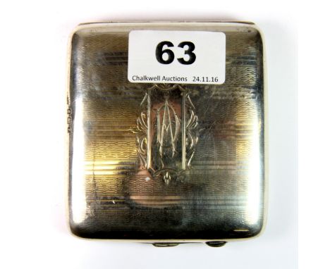A George V hallmarked silver engine turned decorated cigarette case with a faux tortoiseshell lining, Birmingham 1923, 9cm x 