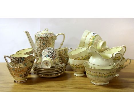 A Tuscan china vintage tea set, together with a Royal Stafford vintage coffee set.