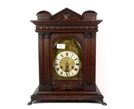 A 19th century oak brass faced striking bracket clock, H. 45cm.