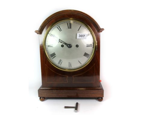 An Edwardian inlaid mahogany double fusee, quarter chiming bracket clock with repeater cord, H. 38cm, understood to be in wor