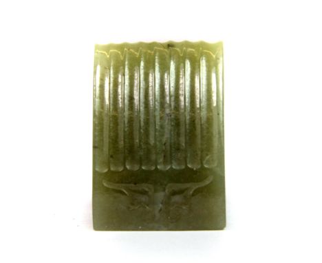 A carved Chinese jade model of a mandarin hair piece, H. 4cm.