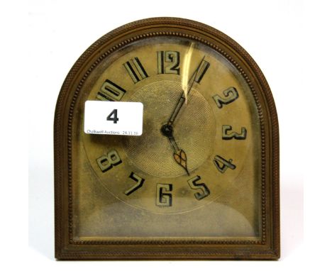 A 1920's brass mantle clock, H. 14cm.