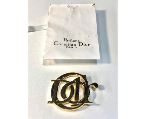 Christian Dior gold tone Logo brooch measures approx 6.2cm by 5.1cm in good condition 