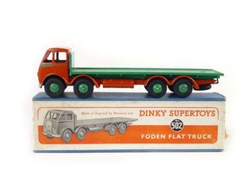 A Dinky Super Toys Fodden flatbed truck, number 502, with orange painted cab, green bed in original box  CONDITION REPORT: Ch