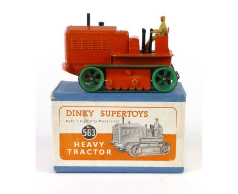 A Dinky Super Toys heavy tractor, number 563, in original box with orange painted body, green wheels and track. CONDITION REP