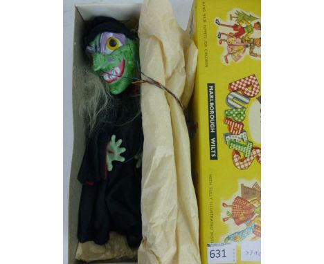 A boxed Pelham puppet of Wicked Witch in original box CONDITION REPORT: Good condition, appears complete

