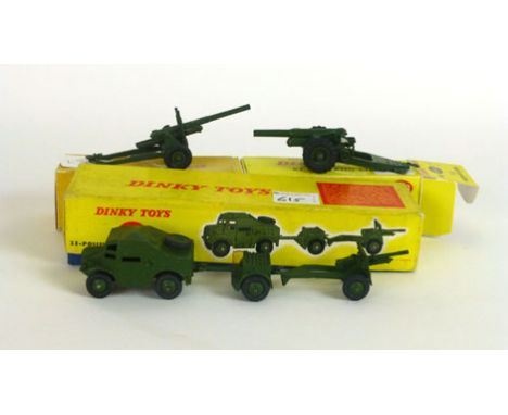 A boxed Dinky Toys twenty five pounder field gun set to include the artillery tractor, field gun trailer number 697 together 