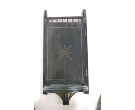 An ebonised and parcel gilt Aesthetic Movement triptych wall mirror with mirrored shelf to base, h. 77 cm, w. 99 cm, d. 29 cm