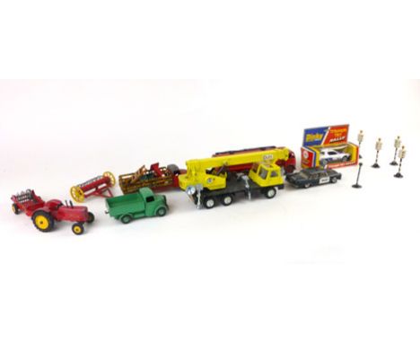 A collection of loose Dinky vehicles to include a coals hydra truck, a Dinky Super Toys Fodden mobile gas truck, Massey Fergu