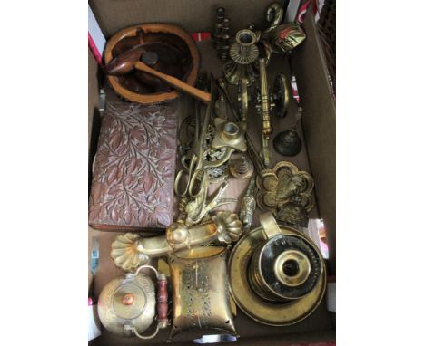 A BOX CONTAINING DECORATIVE DOMESTIC BRASSWARE a yew wood nutcracker, carved box, and an old military medal 