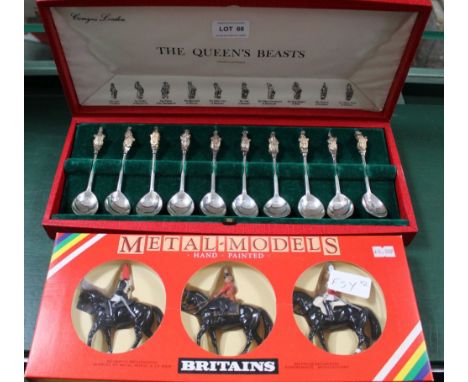 A CASED SET OF HALLMARKED SILVER QUEEN'S BEASTS SPOONS produced in recognition of the Royal Silver Wedding Anniversary in 197