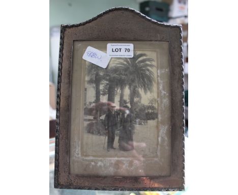 A HALLMARKED SILVER PHOTOGRAPH FRAME with easel action 