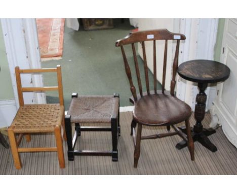 A CHILD SIZED STICK BACK SOLID SEATED CHAIR together with two strung top stools, and an oak circular topped occasional table 