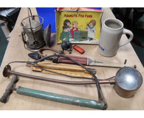A BLUE CRATE OF COLLECTABLE DOMESTIC ITEMS to include; swan necked inspection lamp, sheathed tribal short sword 