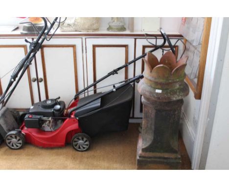 A MOUNTFIELD RS100 PETROL DRIVEN ROTARY MOWER with grass collection box 