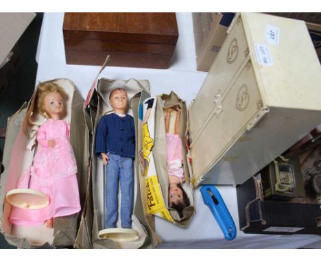 THE REMAINS OF A BOXED SINDY 'PAUL' &amp; 'THAT RASCAL PATCH' DOLLS together with a Sindy branded wardrobe containing clothin