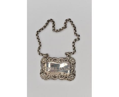 A GEORGE IV SILVER DECANTER LABEL, rectangular label with floral pattern, engraved 'Hollands', hallmarked ' S C Younge &amp; 