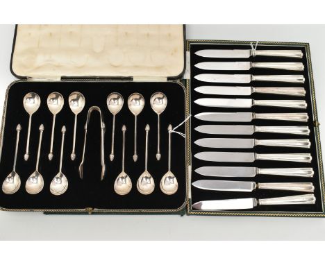 TWO CASED SETS OF SILVER CUTLERY, the first a black case containing a set of twelve teaspoons fitted with pine cone terminals