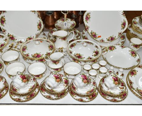 A ONE HUNDRED AND TWENTY NINE PIECE ROYAL ALBERT 'OLD COUNTRY ROSES' DINNER SERVICE AND GIFT WARES, comprising three tureens,