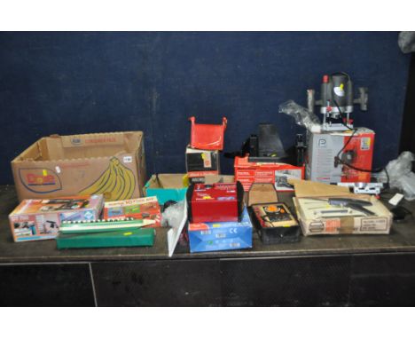 A TRAY CONTAINING TOOLS including a Performance router (PAT pass and working), an AVO 1001 multimeter, Black and Decker plane