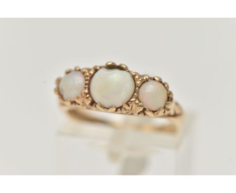 A 9CT GOLD OPAL RING, three round opals, prong set in yellow gold with a scrolled detail gallery, hallmarked 9ct Birmingham 1